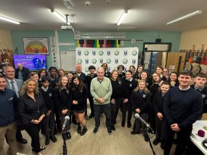 Large group of people in a classroom