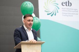 Person speaking a a podium