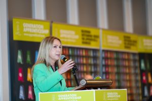 Person speaking at a podium